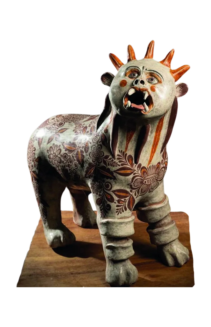 Figura de nahual en barro bruñido con decoración floral y crestas anaranjadas